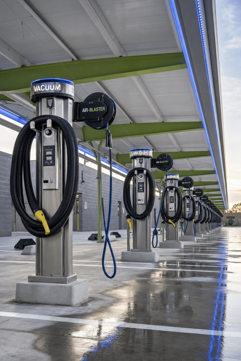Row of covered self-serve vacuum and air-blaster stations